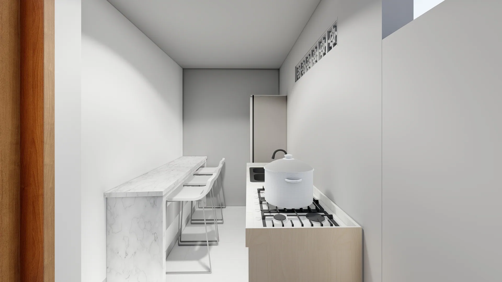 Kitchen and dining counter inside the West Denpasar Residence